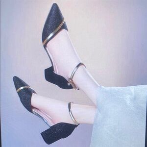 Elegant Black Women's Heels with Gold Accents